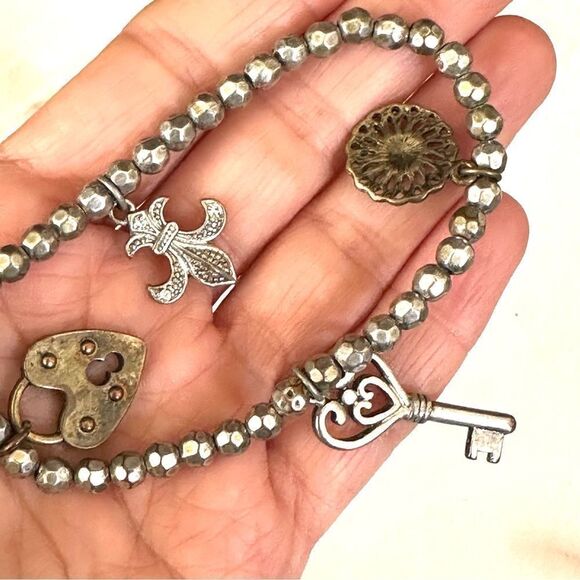 Silver/brass tone charm stretchy bracelet - Picture 2 of 8